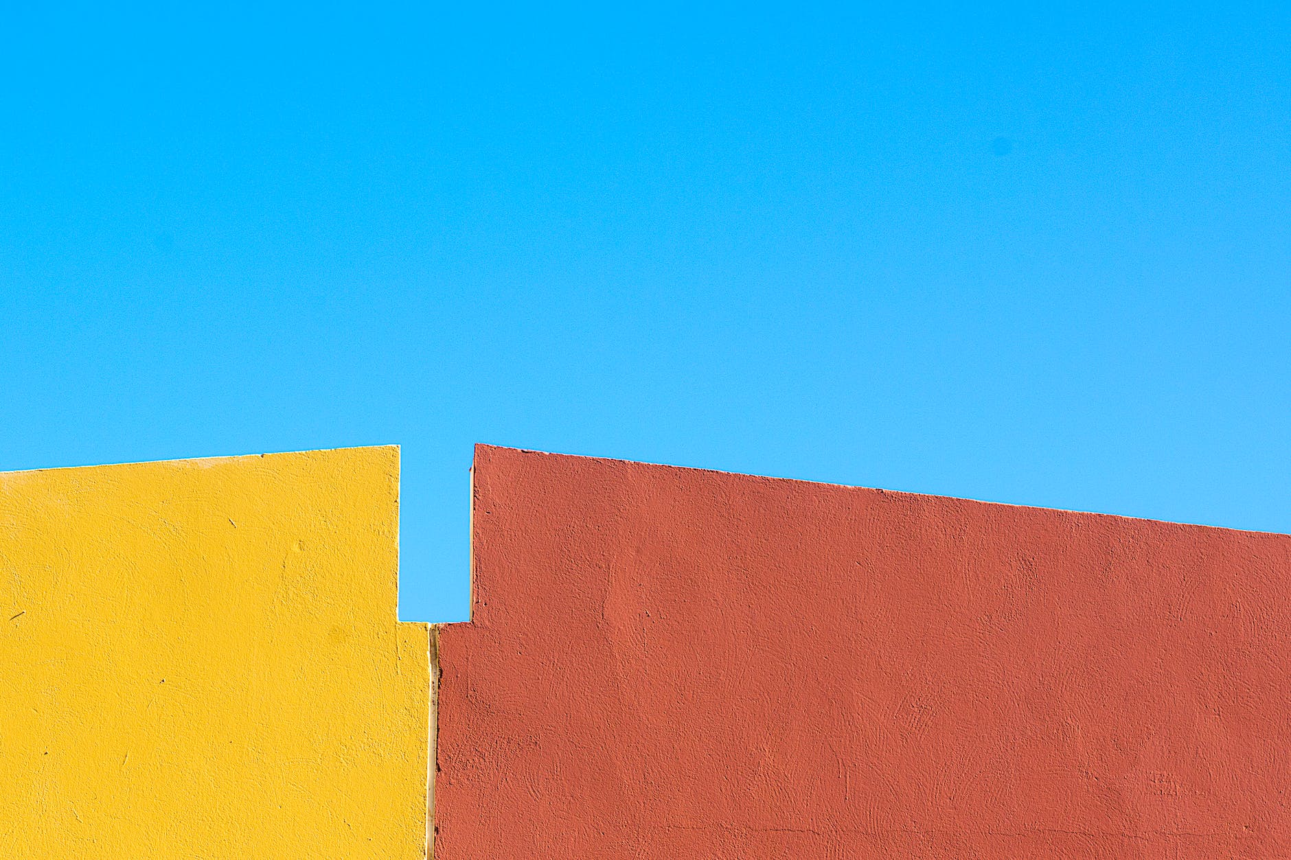 colorful wall against blue sky