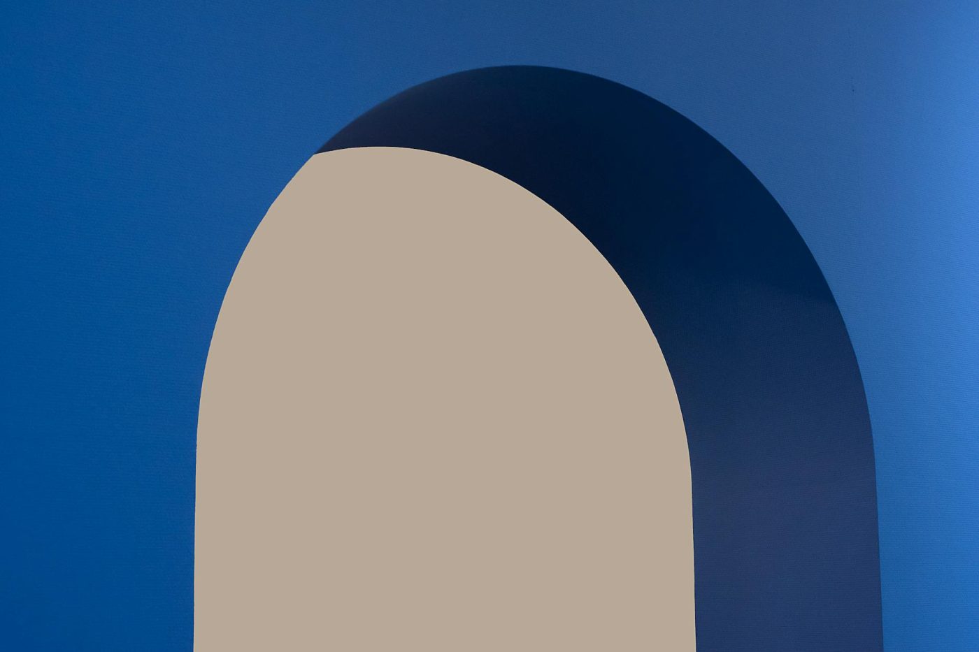 abstract blue archway against beige background